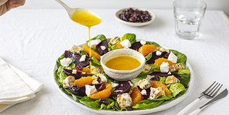 Drizzle dressing over salad